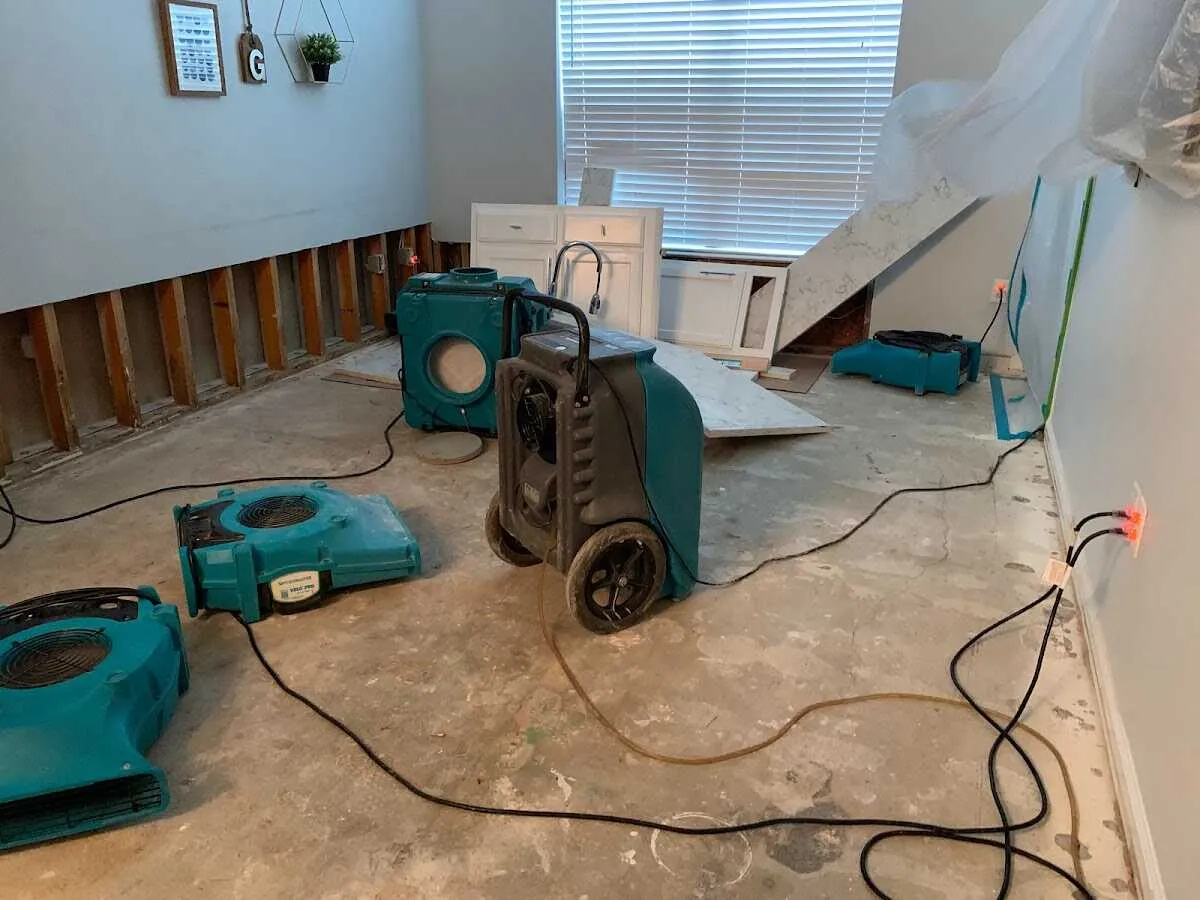 Dehumidifier in flood-cut room for Water Damage Restoration in Toccoa